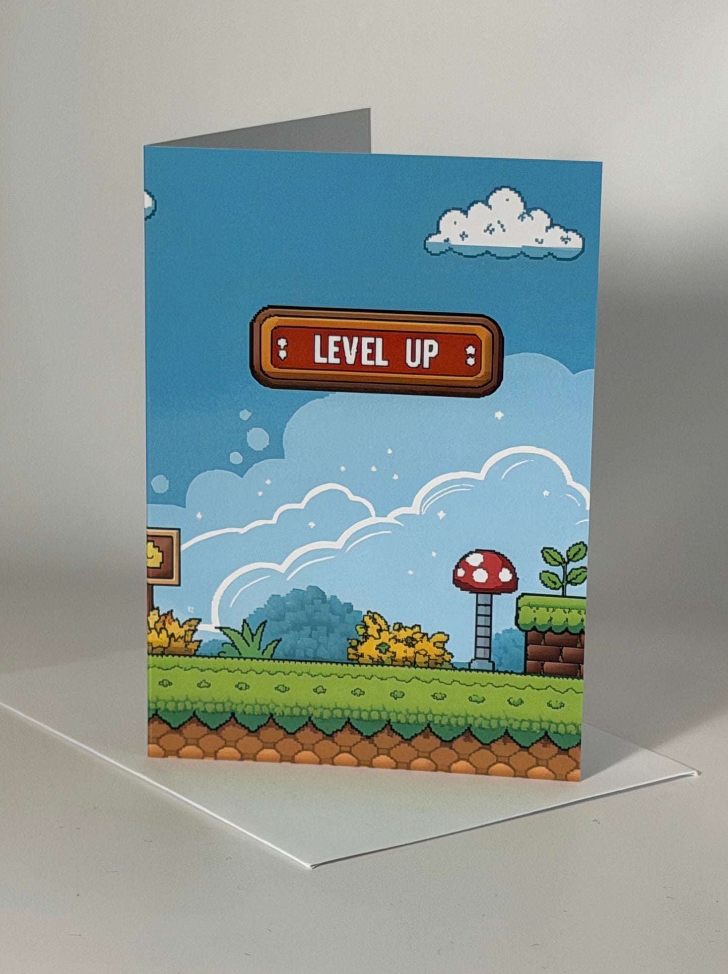 Kort "LEVEL UP" dobbelt m/konvolutt